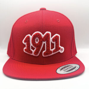 1911 chenille patch on red snapback.